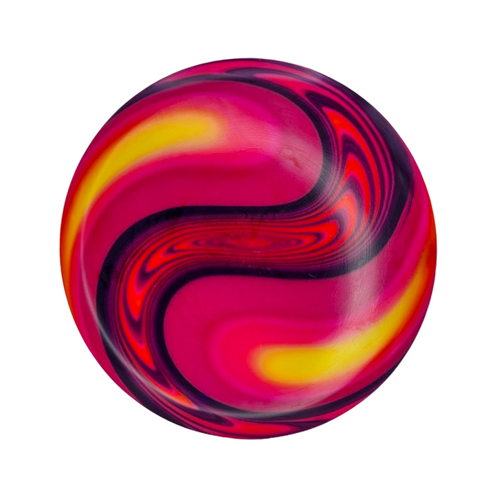 The Element - NXT - Optic Dyes bouncy ball features a swirling pink, red, yellow, and black pattern on a white base, evoking the look of vibrant hand-dyed canvas art.