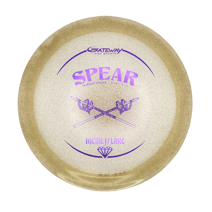 The Spear - Diamond (Metal Flake) is a white and gold 9-speed disc golf driver with gold speckles, purple crossed spear graphics, and the Gateway Disc Sports logo—ideal for straight, precise throws.