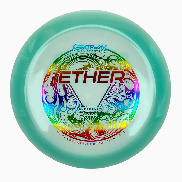 A light blue Ether - Diamond Superglow distance driver featuring a vibrant, ornate top print and product details—ideal for maximum distance throws.