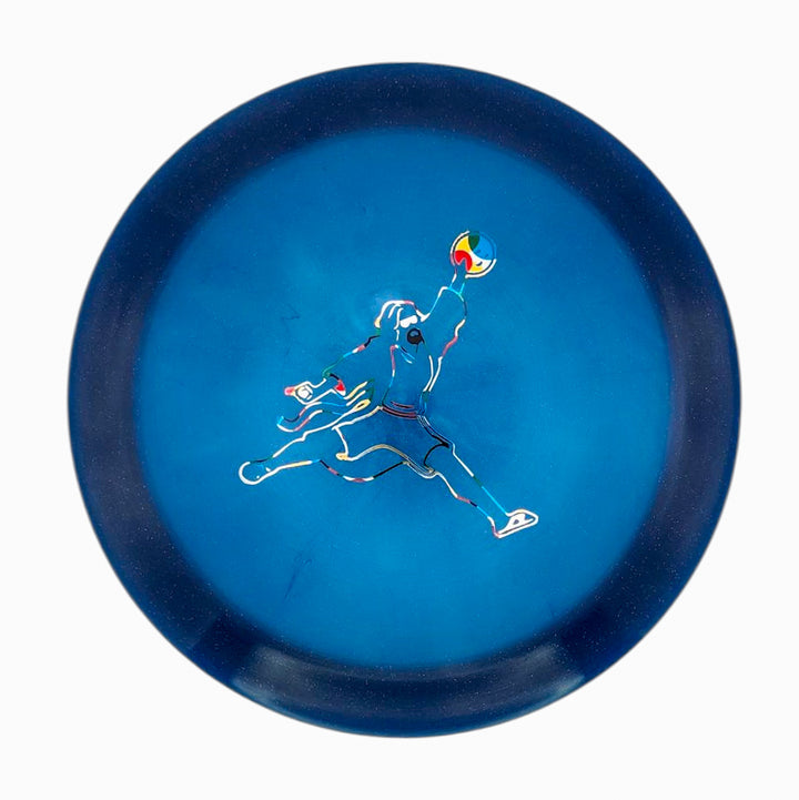 The Realm - Diamond - Air Dude is a blue max distance driver disc golf disc with an outline illustration of a person jumping to catch a disc—ideal for power throwers chasing long, impressive throws.