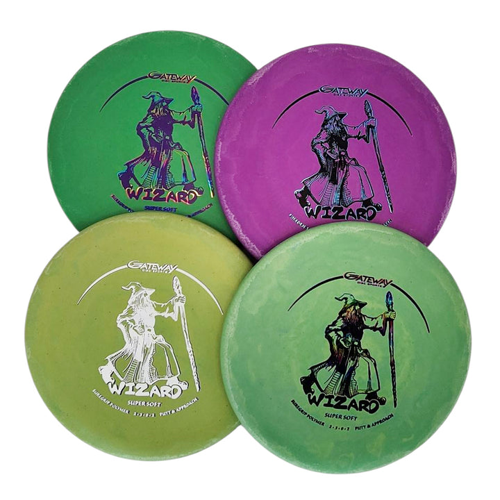 Four Wizard - SS putters—a stable workhorse—are arranged in a square: two green, one yellow, and one purple. Each features a wizard holding a staff graphic.