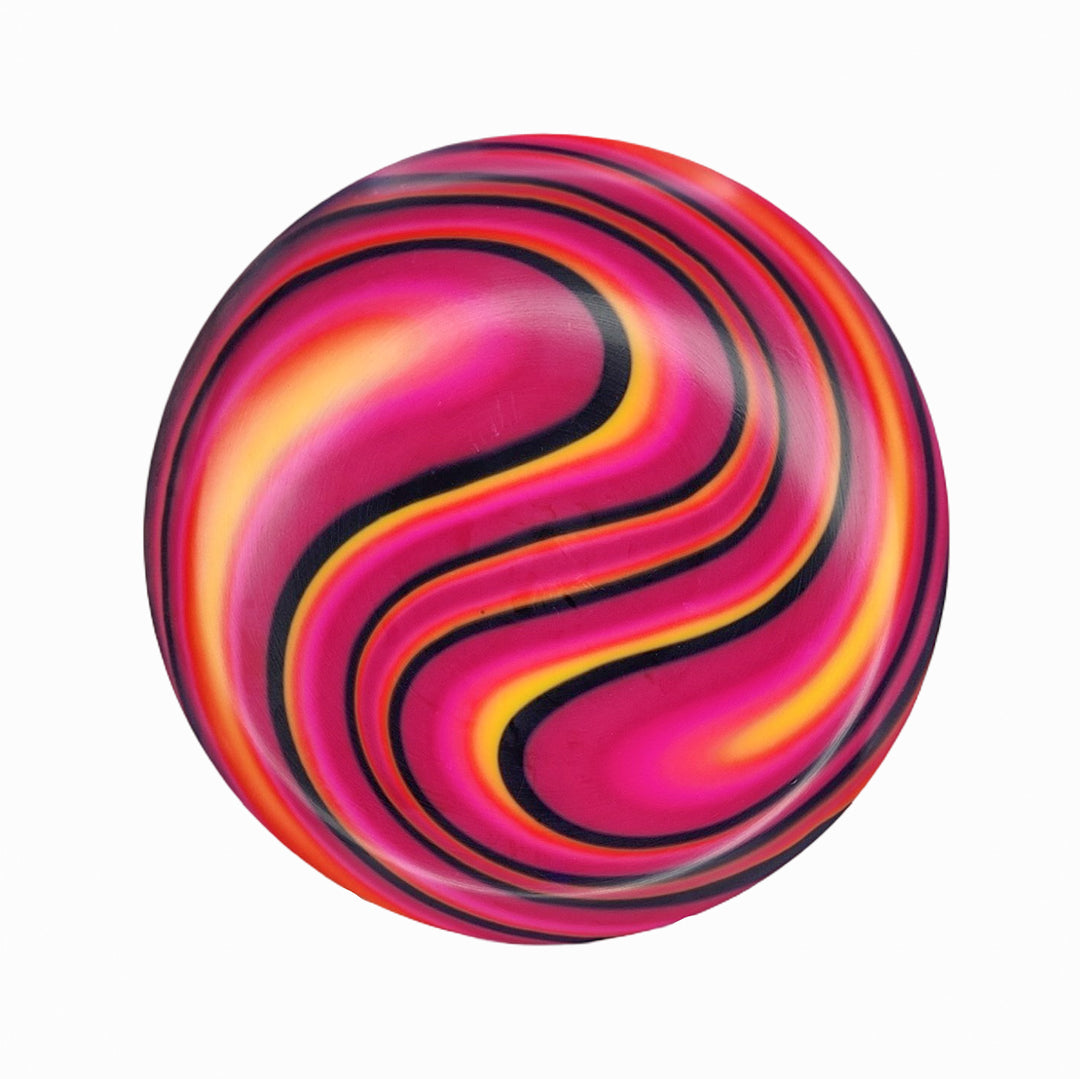The Element NXT Optic Dyes is a mid-range disc with vibrant pink, yellow, orange, and black swirls on a white base—ideal for players who love unique hand-dyed designs.