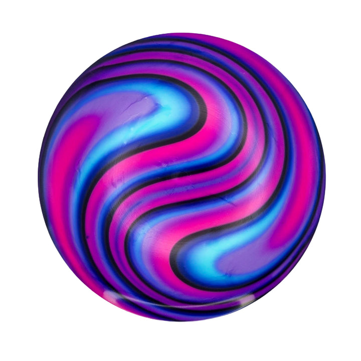 Element - NXT - Optic Dyes features a round design with swirling blue, purple, pink, and black patterns on a white base, evoking the look of vibrant hand-dyed discs or artistic dye canvases.