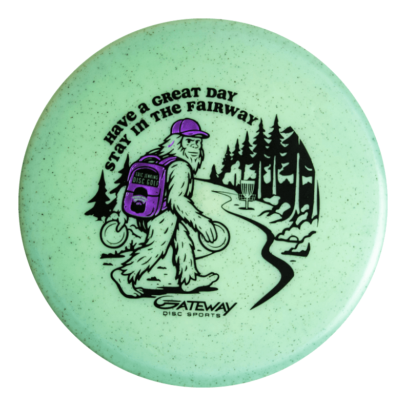 The Eric Jenkins Signature Series Chief - Diamond Hemp features Bigfoot carrying discs and a backpack by trees with €œHave a great day. Stay in the fairway.€�€”ideal for fans of unique art and the reliable beaded rim putter feel.