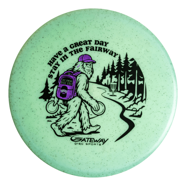 The Eric Jenkins Signature Series Chief - Diamond Hemp features Bigfoot carrying discs and a backpack by trees with €œHave a great day. Stay in the fairway.€�€”ideal for fans of unique art and the reliable beaded rim putter feel.