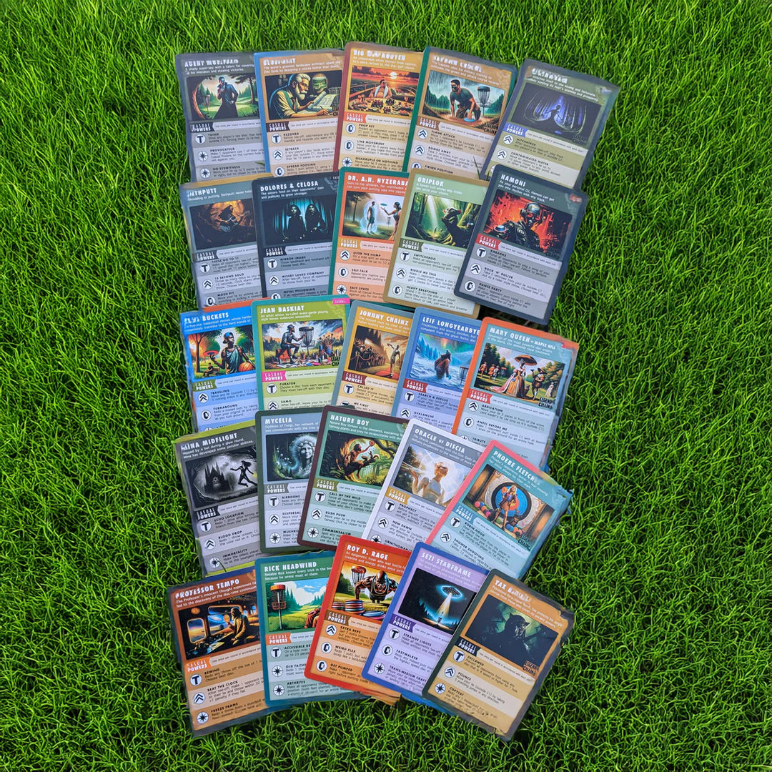 A set of Legends of the Chains: On-Course Disc Golf Game character cards is displayed on green grass, showcasing unique artwork, stats, and disc golf-themed details.