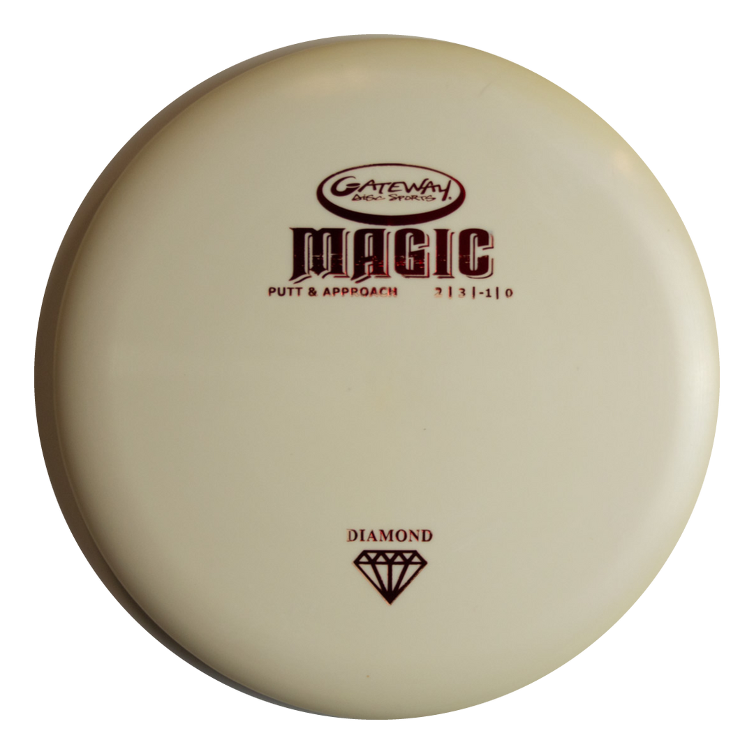 The Magic - Diamond is a straight-flying white putter with brown disc specs, a diamond graphic, and "Diamond" below€”ideal for beginners or dependable putting.