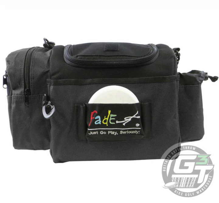 The Fade Gear Crunch Box Disc Golf Bag is a durable black bag with multiple pockets, a padded shoulder strap, a visible white disc, and a "Fade" logo patch on the front saying "Just Go Play. Seriously!" Perfect for everyday play.