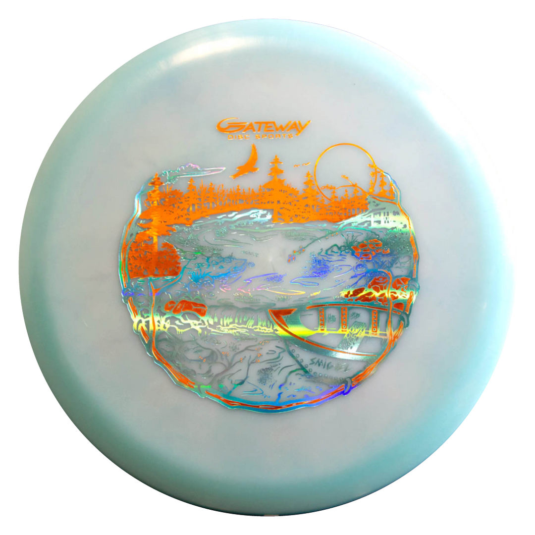 The Sam Smigiel's Element - NXT Color Superglow is a light blue mid-range disc featuring an orange and metallic nature scene with trees, birds, a river, and bridge plus the Gateway logo. Delivers straight flight and amazing glide.