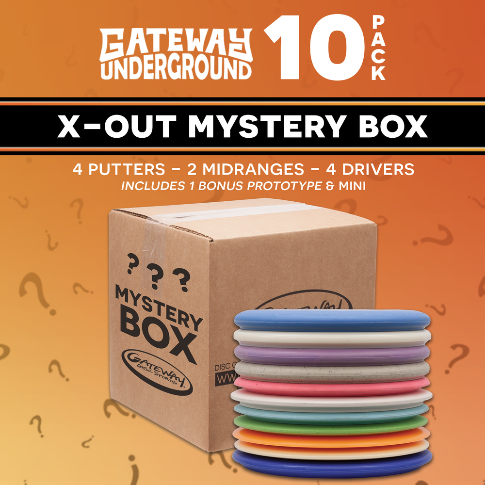 Gateway Factory 2nd Mystery 10-Pack: Get a surprise selection of Factory Seconds, occasional prototypes & mini discs. A box with question marks sits behind colorful disc golf discs, hinting at the exciting mystery inside.
