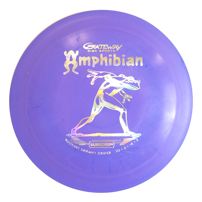 The Amphibian - SureGrip™ disc golf disc features a purple design with a white illustration of a running figure carrying a frog, perfect for smooth control driver shots and reliable fairway drives.