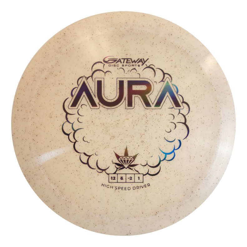 The Aura - Diamond Hemp is a beige disc golf driver with a speckled pattern and cloud and star graphics. It features numbers 12, 6, -2, 1 and is designed for easy turnover shots and long flights. Labeled "AURA" by Gateway Disc Sports.
