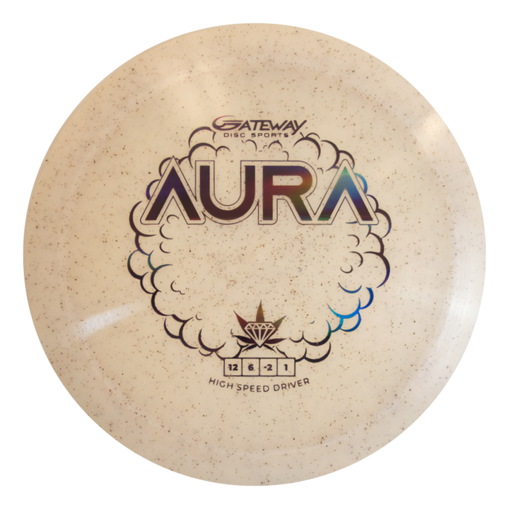 The Aura - Diamond Hemp is a beige disc golf driver with a speckled pattern and cloud and star graphics. It features numbers 12, 6, -2, 1 and is designed for easy turnover shots and long flights. Labeled "AURA" by Gateway Disc Sports.