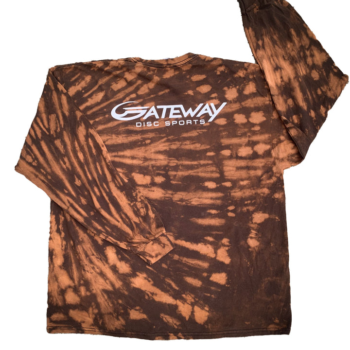 The Brown Tie Dye T-shirt is a Gildan Heavy Cotton long sleeve with brown and orange tie-dye and "Gateway Disc Sports" printed in white on the upper back.