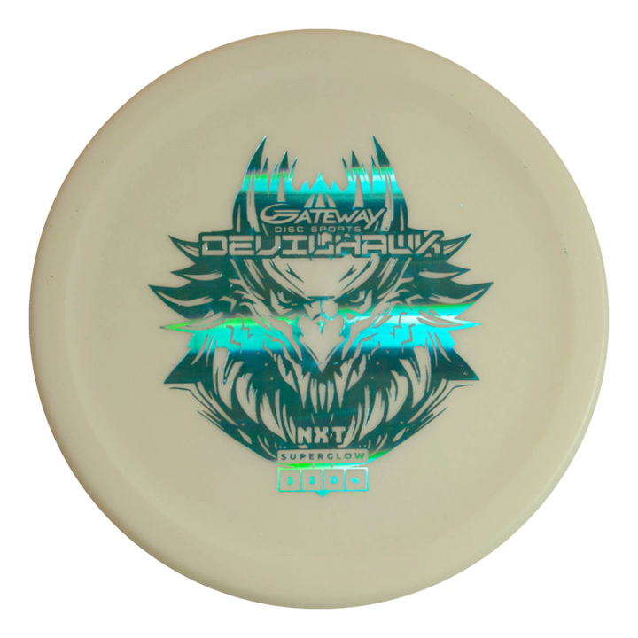 A white Devilhawk - NXT Superglow disc golf putter with a teal holographic animal face and "Gateway Disc Sports Devilhawk NXT Superglow" text, made from durable plastic and ideal as an overstable putt and approach disc.