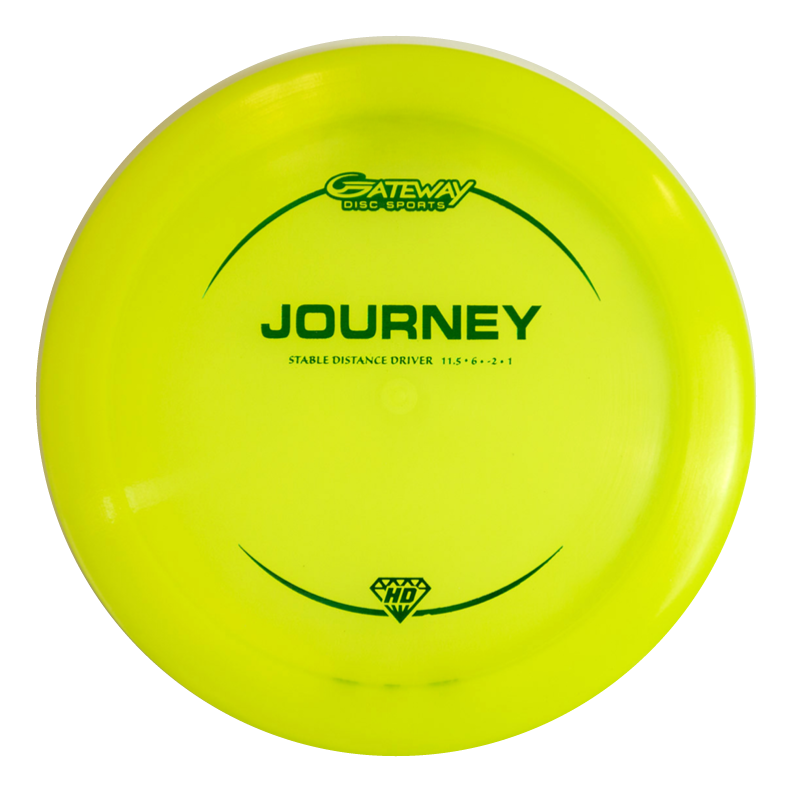 A yellow Gateway Disc Sports Journey - Hyper Diamond (HD) long-range distance driver with green text and flight numbers 11.5, 6, -2, 1 is shown on a white background, designed for controllable flight.