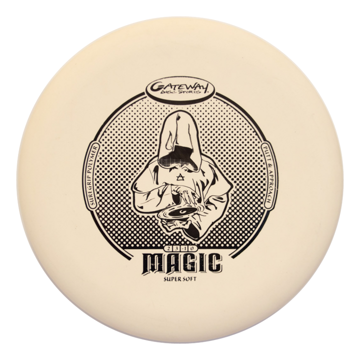 The Magic - Suregrip - SS is a cream-colored putter with a black hooded figure graphic, labeled "Magic Super Soft" and "Gateway Disc Sports"€”ideal for players seeking a straight-flying disc.