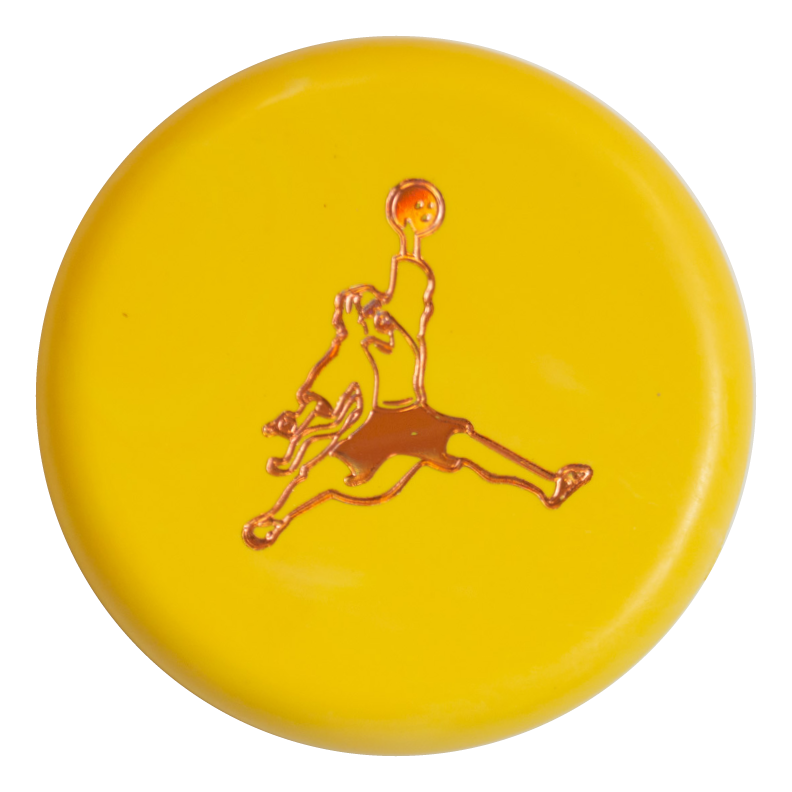 A yellow circular button featuring the Air Dude Mini (Large) - SureGrip stamp—a stylized person holding a ball—stands out at the center, inspired by the dynamic look of SureGrip mini accessories in vibrant colors.