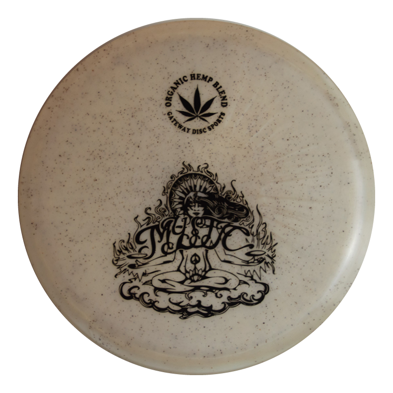 The Mystic - Diamond Hemp is a beige frisbee made from an organic hemp blend, featuring a black meditating figure and "MYSTIC" on the front, designed for controllable mid-range and straight flights.