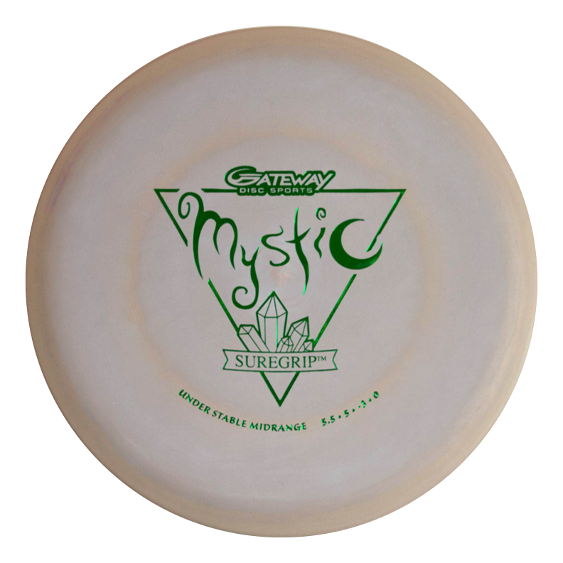 The Mystic - SureGrip is a beige disc golf disc with green text and graphics, designed for effortless straight flights with more glide and controllable mid-range feel.