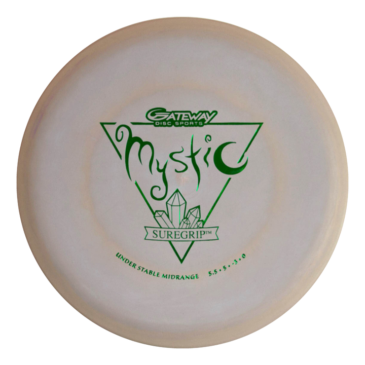 The Mystic - SureGrip is a beige disc golf disc with green text and graphics, designed for effortless straight flights with more glide and controllable mid-range feel.