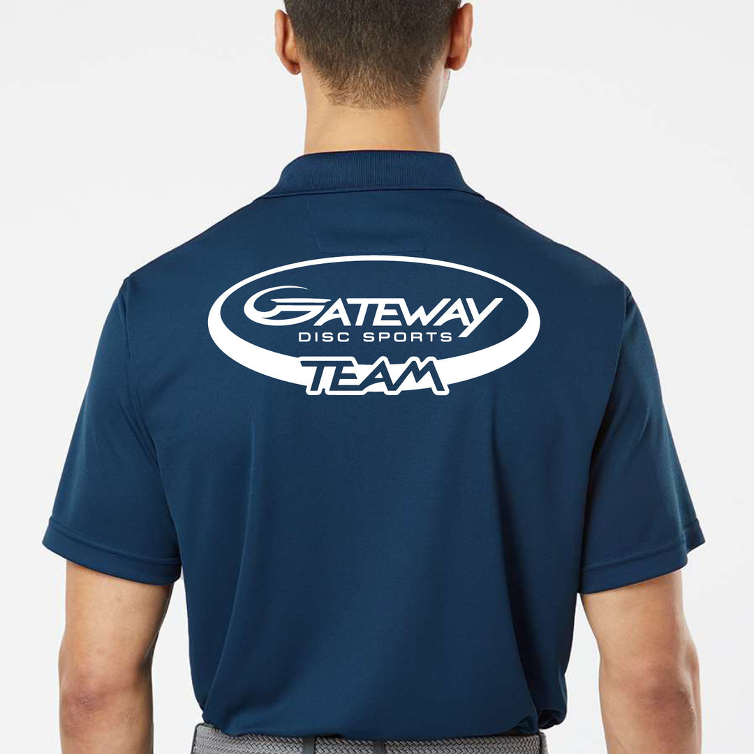 A person wearing a Navy Team Gateway Polo with the "Gateway Disc Sports Team" logo in white on the back, offering UPF 30+ protection and advanced moisture management.