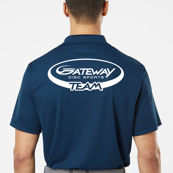 A person wearing a Navy Team Gateway Polo with the "Gateway Disc Sports Team" logo in white on the back, offering UPF 30+ protection and advanced moisture management.