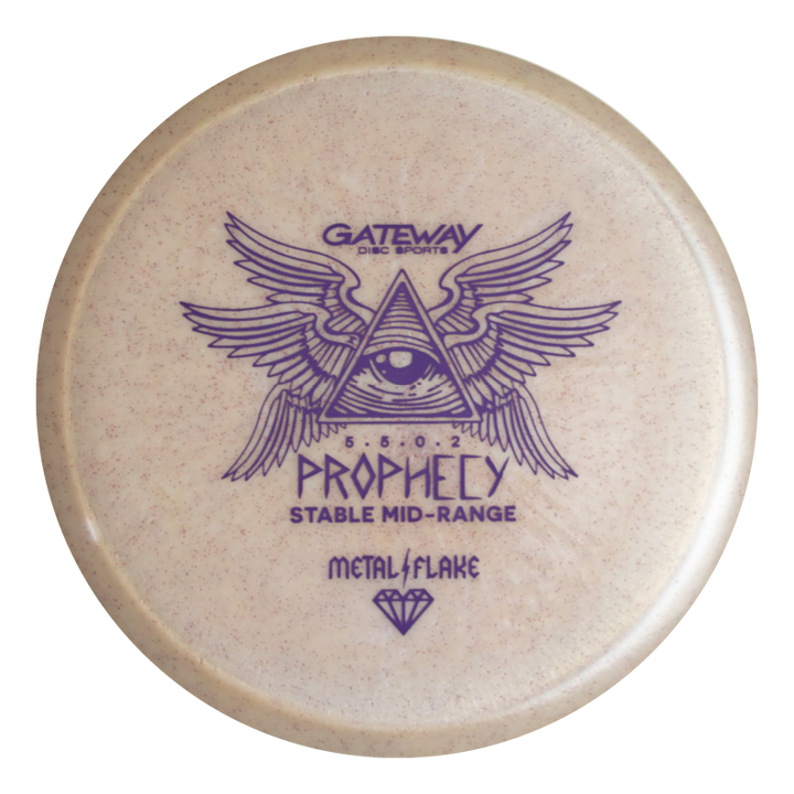 The Prophecy - Diamond Metal Flake is a beige, overstable mid-range disc golf disc in premium blend with purple all-seeing eye and wings art, labeled "Prophecy Stable Mid-Range" and "Gateway Disc Sports," designed for consistent flight.