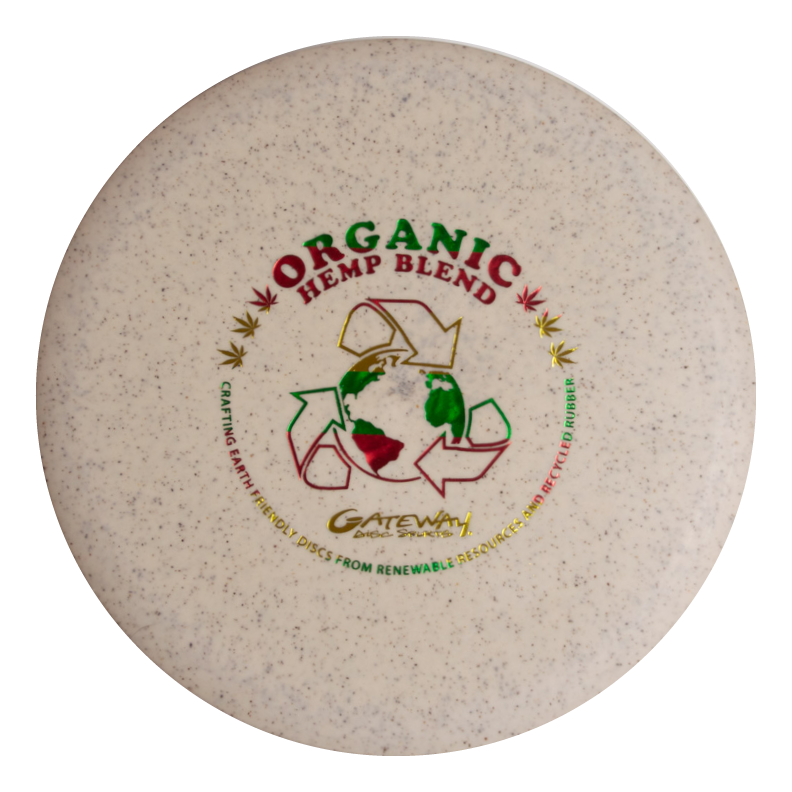 The Prophecy - Suregrip Hemp is a beige, overstable mid-range disc golf disc made from an organic hemp blend, featuring recycling symbols, a globe graphic, eco-friendly text, and offers a reliable fade.