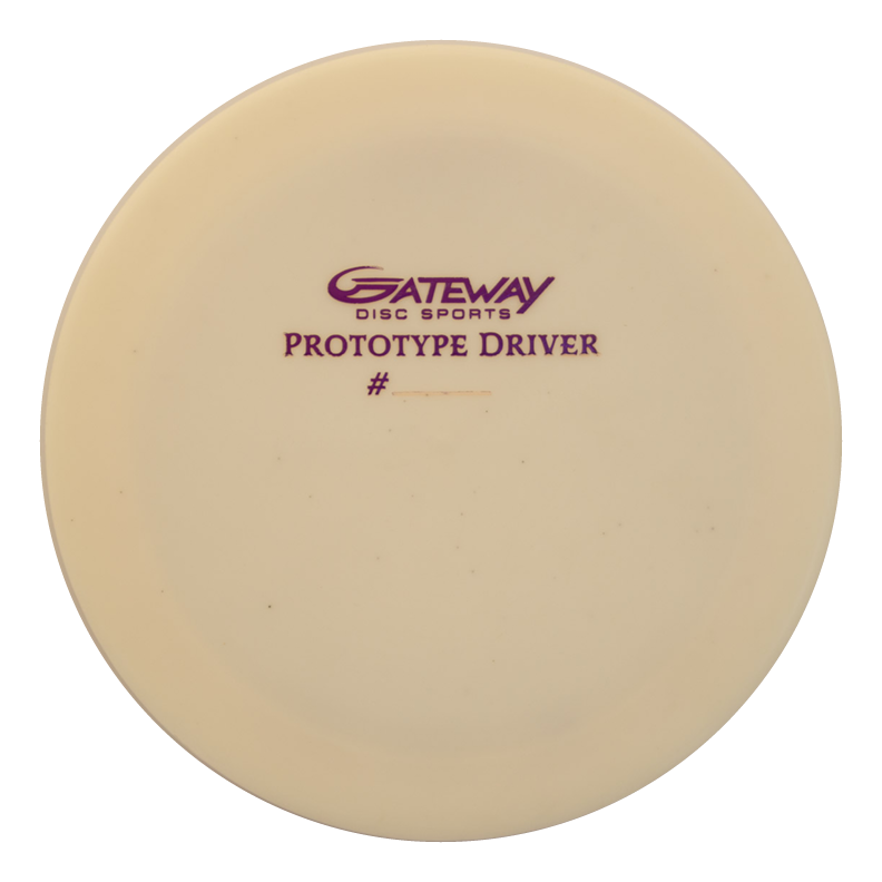 A cream-colored Prototype 136 - NXT (Javelin) disc golf distance control driver with "Gateway Disc Sports Prototype Driver #" printed in purple text on the top.