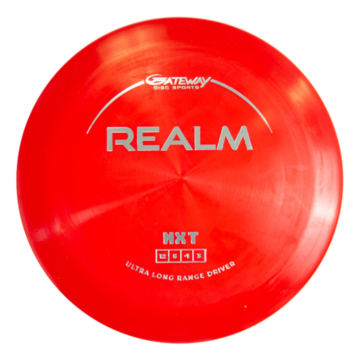 The Realm - NXT is a red distance driver disc from Gateway Disc Sports, featuring "NXT Ultra Long Range Driver" on durable plastic€”perfect for power throwers aiming for maximum distance.