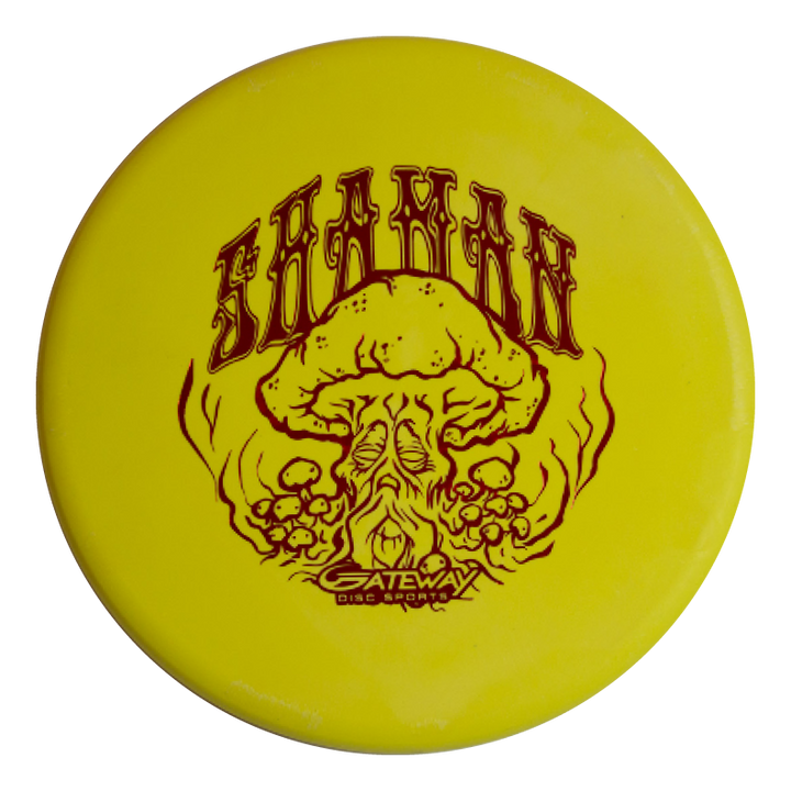 The Shaman - SSS - Mushroom is a yellow disc golf disc with "SHAMAN" and "Gateway Disc Sports" text, featuring a special mushroom-headed shaman design by James Zimmerman.