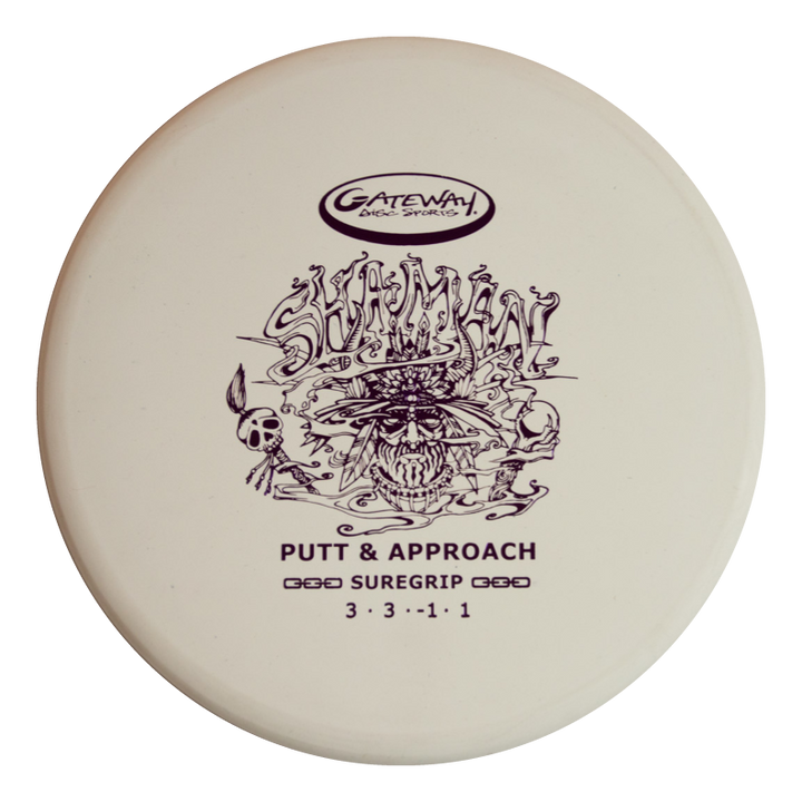 The Shaman - Suregrip is a white Super Soft disc golf putter featuring a detailed skull design, flat 25° nose, and flight ratings of 3 3 -1 1€”perfect for holding any line on your putts and approach shots.