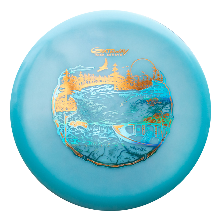 The Sam Smigiel's Element - NXT Color Superglow is a blue mid-range disc golf disc with gold and blue river, trees, bridge, and bird art, featuring the "Gateway Disc Sports" logo and offering unbelievable glide.