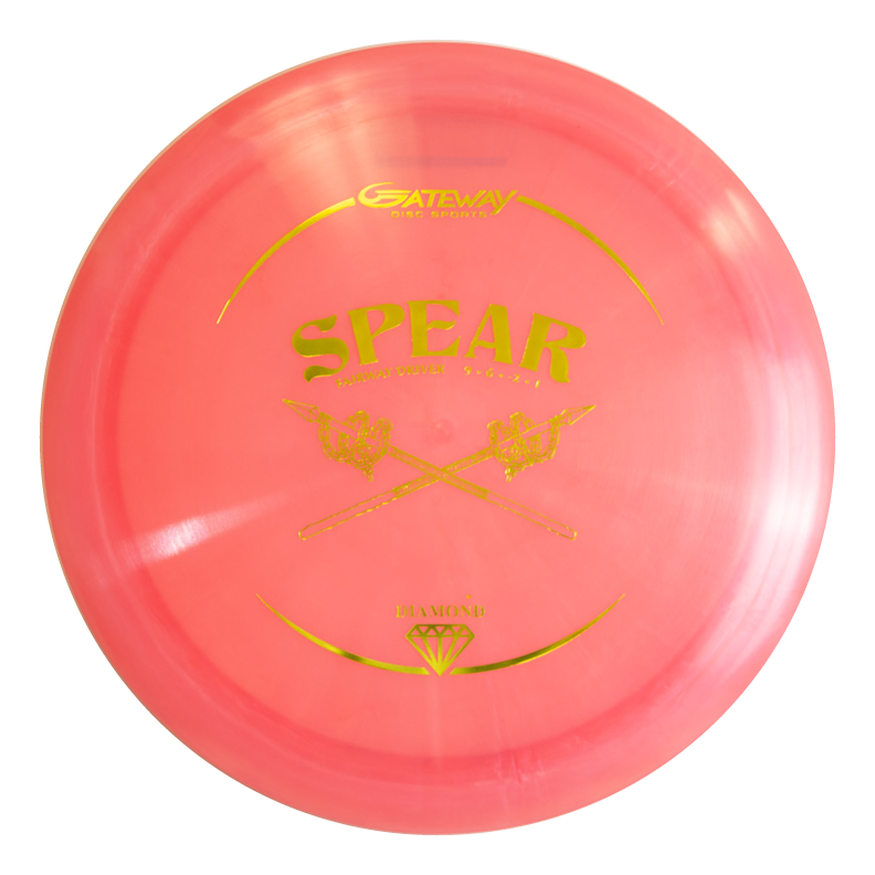 A pink Spear - Diamond control driver disc golf disc with gold lettering and two crossed spears in the center, designed for accurate placement.