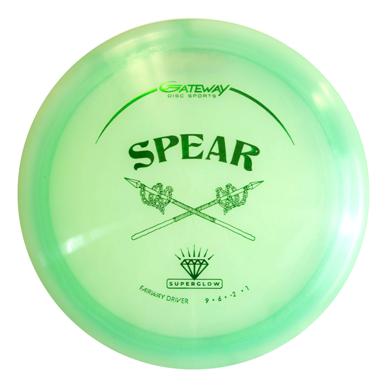 The Spear - Diamond Superglow is a light green control driver with two crossed spears and "Gateway Disc Sports" branding on top, designed for a comfortable grip.