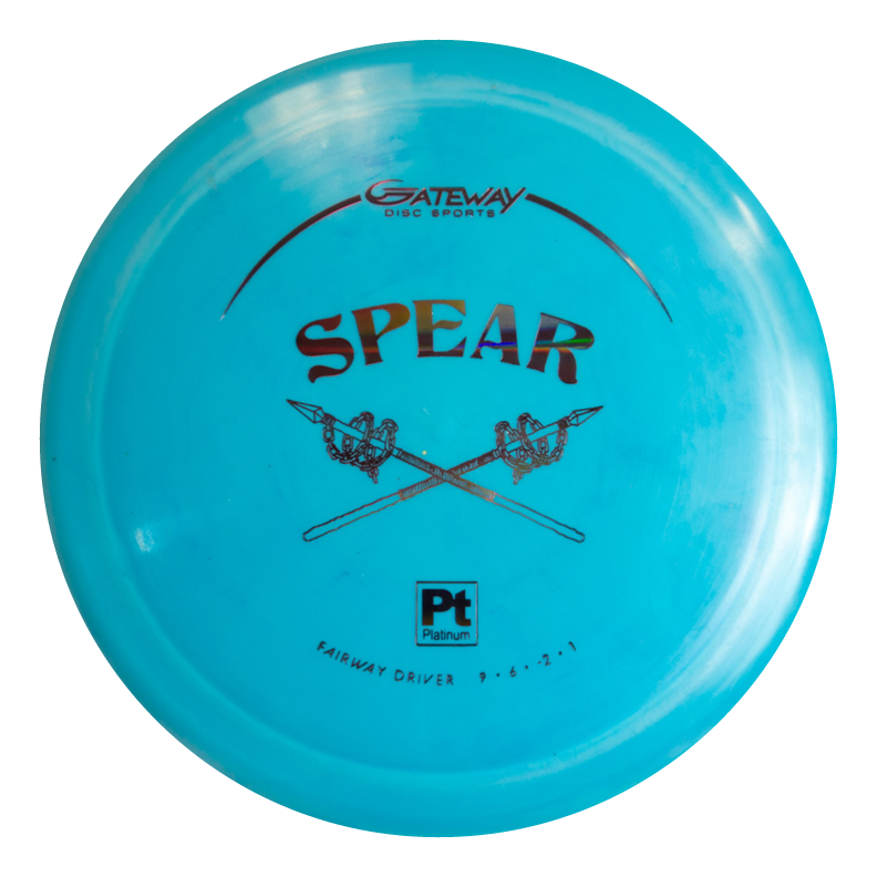 The Spear - Platinum is a blue Gateway Disc Sports fairway driver disc featuring crossed spears and "FAIRWAY DRIVER Pt PLATINUM" text, designed for accurate placement as a reliable control driver on the course.