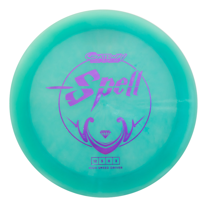 A teal overstable Spell - Diamond driver disc golf disc featuring the word "Spell" and Gateway logo in purple on top, designed for powerful throws in windy conditions.