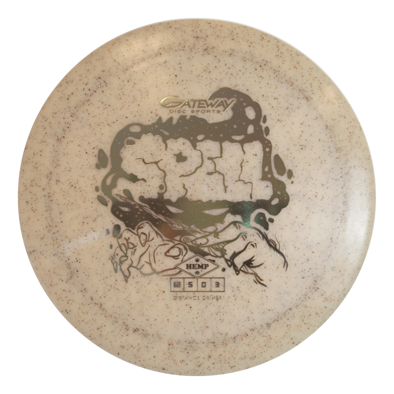 The Spell - Diamond Hemp is a beige disc golf disc with graffiti-style "SPELL" text, hand illustration, Gateway Disc Sports logo, and "hemp" material marking, crafted in premium plastic for maximum velocity throws.
