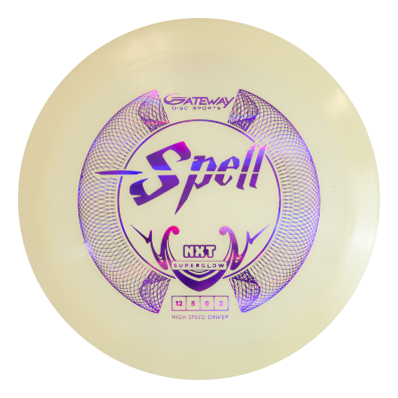 The Spell - NXT Superglow is a white disc golf driver by Gateway Disc Sports, featuring purple geometric designs, built for wind-crushing power throws with overstable flight and durable plastic.