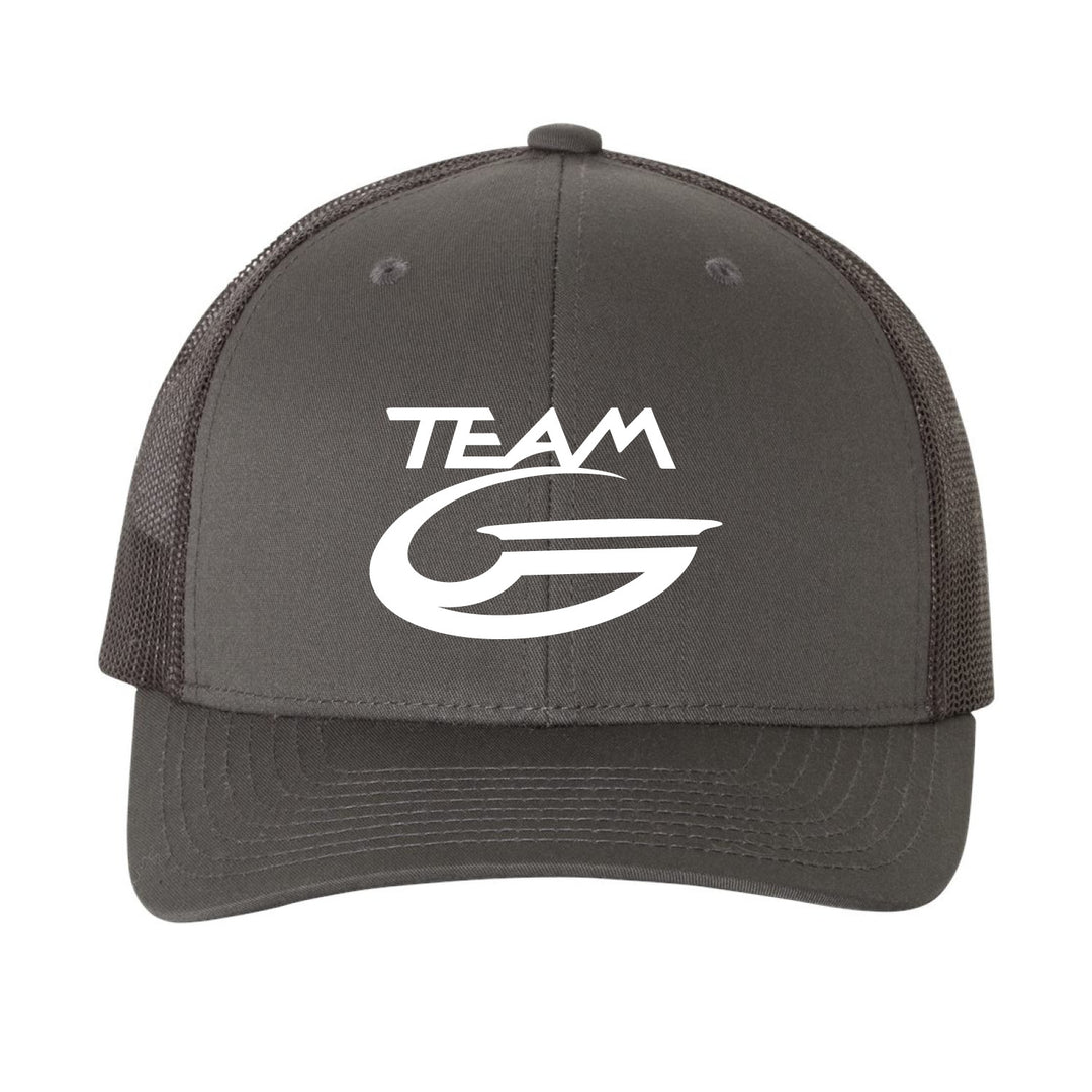 The Team Gateway Trucker Cap is a dark gray retro hat with a mesh back and snapback closure, featuring "TEAM G" text and a white stylized "G" logo on the front.