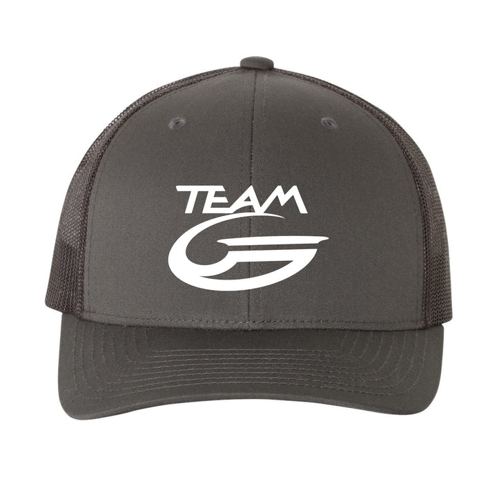 The Team Gateway Trucker Cap is a dark gray retro hat with a mesh back and snapback closure, featuring "TEAM G" text and a white stylized "G" logo on the front.