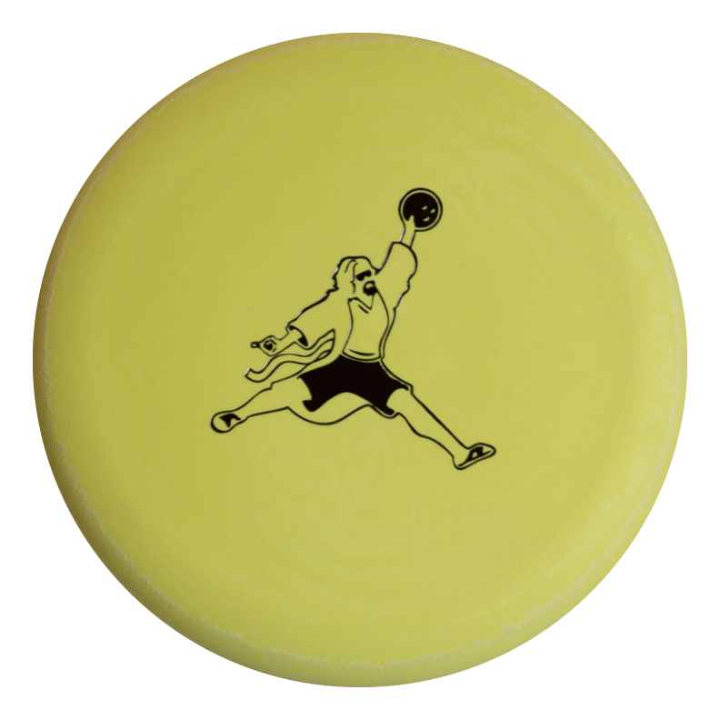 The Wizard Suregrip - Air Dude- 4S is a yellow frisbee with a black illustration of a person in motion holding a disc€”perfect for fans of Gateway Disc Sports putters.