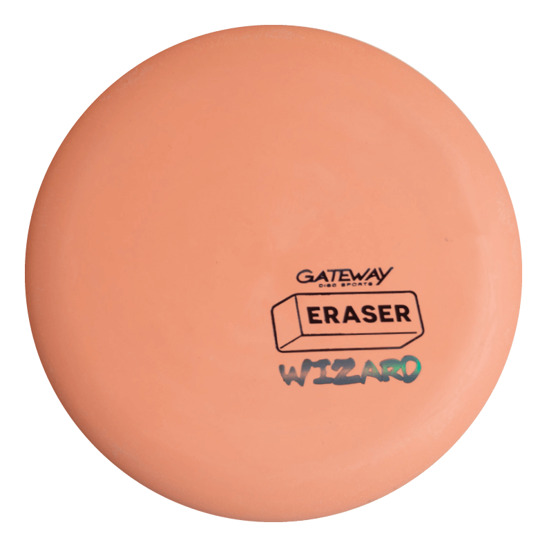 The Wizard - Eraser is a stable, peach-colored disc golf putter featuring the Gateway logo and "ERASER" and "WIZARD" text. It excels at mid-range drives and delivers reliable performance, even in windy conditions.