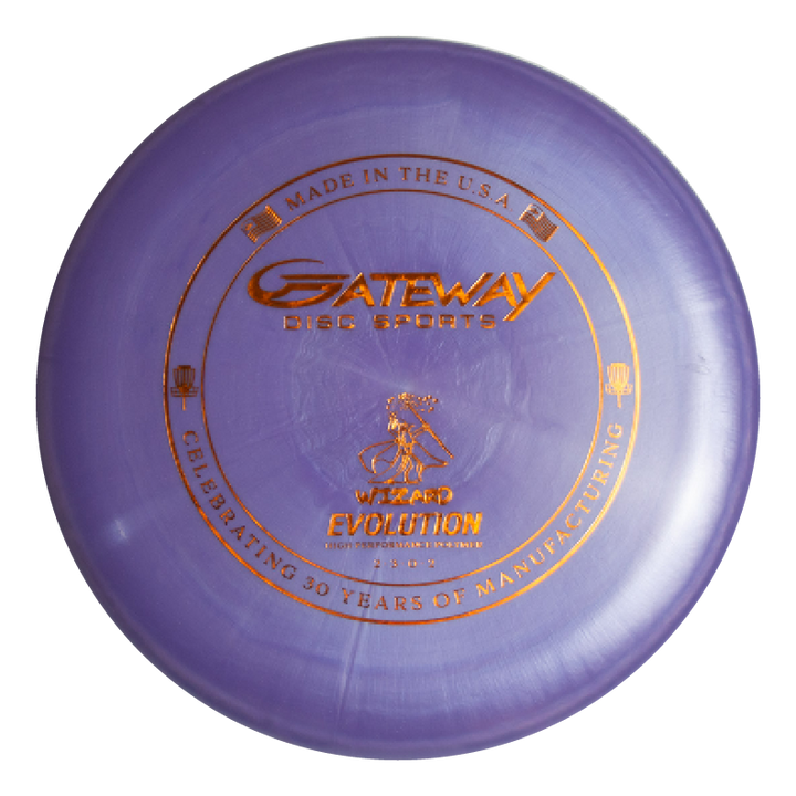 A purple Gateway Disc Sports Wizard - Evolution - Galaxy disc with gold text and graphics, labeled "Celebrating 30 Years of Manufacturing." Ideal for collectors marking the 30th Anniversary.