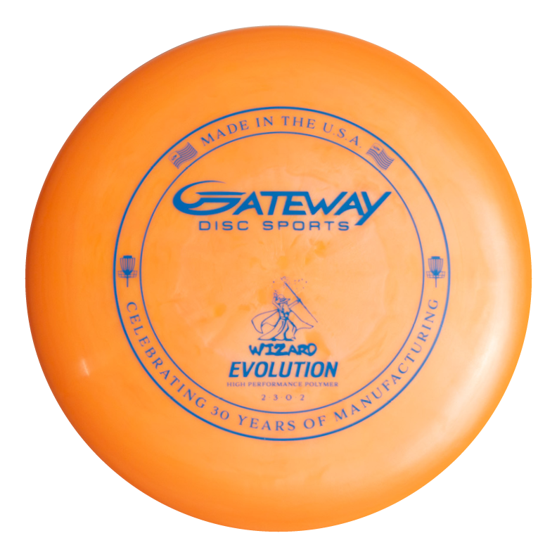 An orange Wizard - Evolution - Neon disc from Gateway Disc Sports, with blue text and graphics, celebrates 30 years of manufacturing and is marked "Made in the U.S.A.