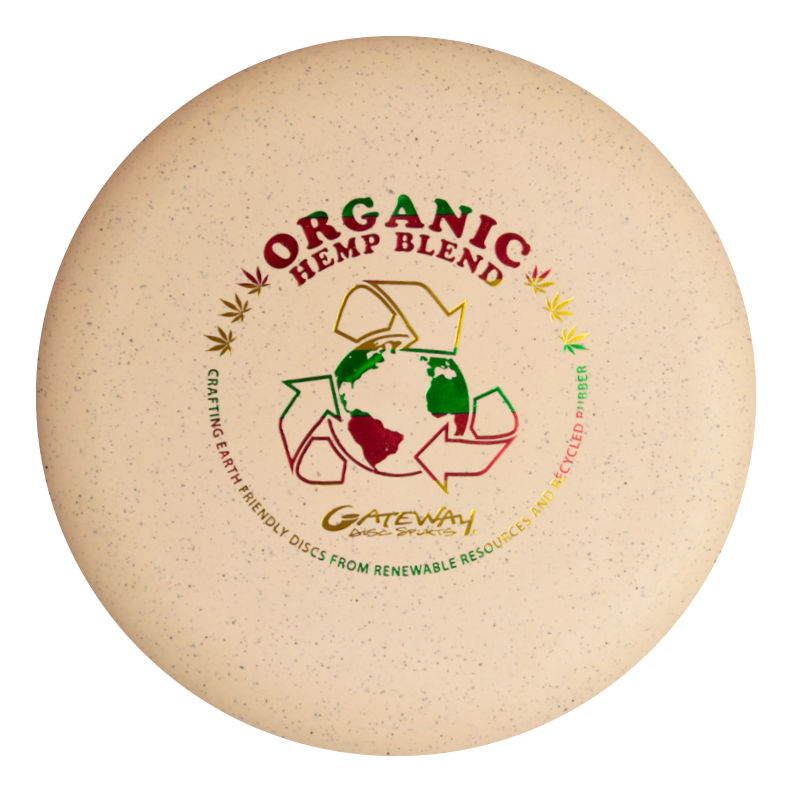 The Wizard - SS - Hemp is a beige disc golf disc labeled "Organic Hemp Blend," with globe and recycling graphics, promoting Gateway Disc Sports' eco-friendly materials€”ideal as a reliable mid-range or stable workhorse putter.