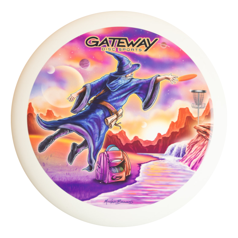 The Wizard - Vivid Color #3 is a disc featuring a wizard throwing toward a basket in a vibrant fantasy landscape with mountains and planets, enhanced by advanced in-mold labeling.
