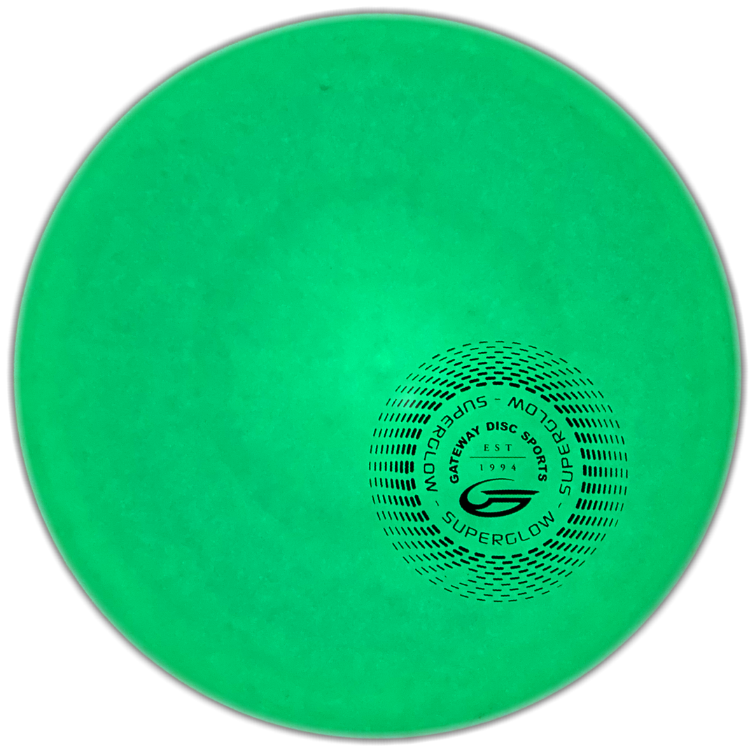 The Magic - Suregrip Superglow - SS is a glowing green approach disc featuring the "Gateway Disc Sports Superglow" logo in black, designed for excellent glide and precision putting.