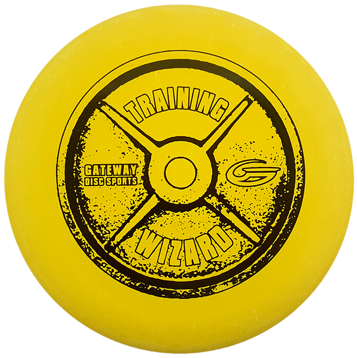The Wizard - Training Weight is a yellow disc golf putter featuring "Training Wizard," "Gateway Disc Sports," and a circular weight plate graphic in black—this stable putter delivers reliable mid-range drives and consistency, even in windy conditions.